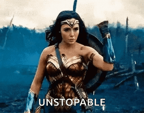 A Woman In A Wonder Woman Costume Is Holding A Shield And A Sword And Says `` Unstoppable '' . GIF
