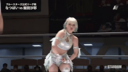 a woman in a wrestling ring with #stardom written on the bottom right