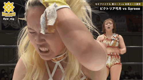 A Woman In A Wrestling Ring With The Hashtag #Pw_mg On The Bottom GIF