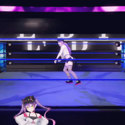 A Woman In A Wrestling Ring With The Letter W On The Wall Behind Her GIF