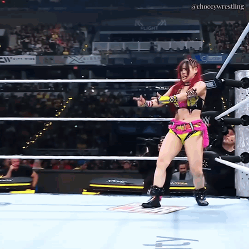 A Woman In A Wrestling Ring With The Words Choccy Wrestling On The Bottom GIF