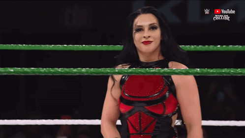 A Woman In A Wrestling Ring With Youtube Written On The Bottom GIF