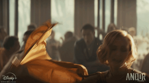 Woman In Yellow Dress Dancing In Front Of Disney+ GIF