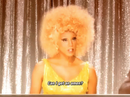 A Woman In A Yellow Dress With A Large Afro Says Can I Get An Amen GIF
