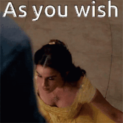 A Woman In A Yellow Dress With The Words As You Wish GIF