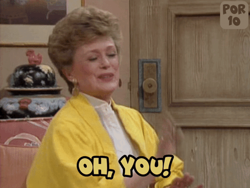 A Woman In A Yellow Jacket Is Clapping And Saying Oh You GIF