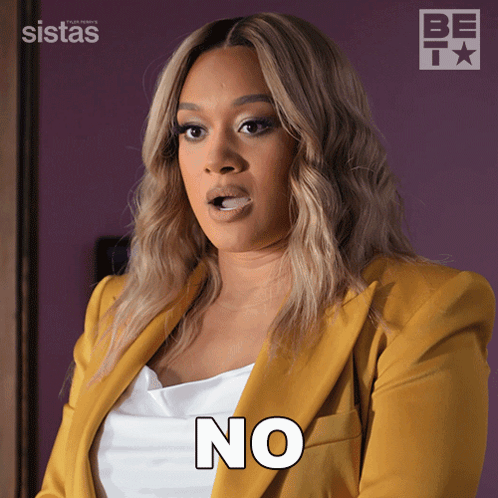 A Woman In A Yellow Jacket Says " No " GIF