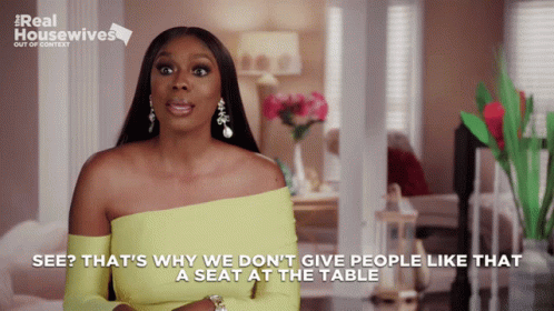 A Woman In A Yellow Off The Shoulder Top Says See That 'S Why We Don 'T Give People Like That GIF