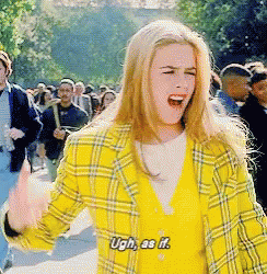 A Woman In A Yellow Plaid Jacket Says Ugh As If In Front Of A Crowd GIF