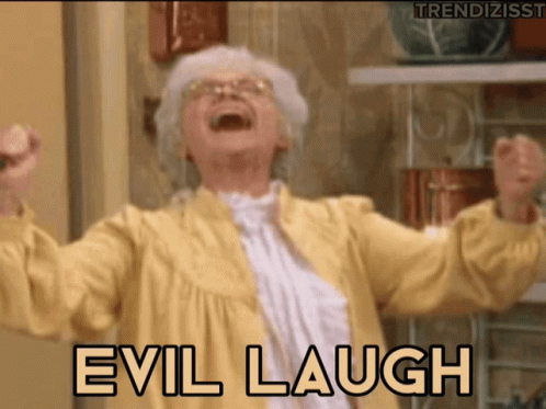 A Woman In A Yellow Robe Is Laughing With The Words Evil Laugh Behind Her GIF
