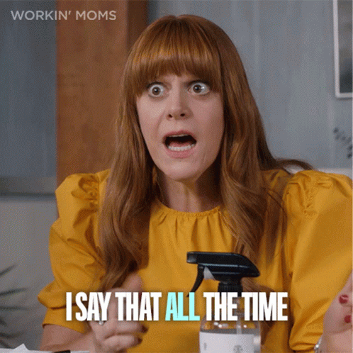 A Woman In A Yellow Shirt Is Holding A Spray Bottle And Saying I Say That All The Time GIF