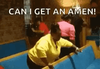 A Woman In A Yellow Shirt Is Jumping Over A Pool Table With The Words `` Can I Get An Amen '' . GIF