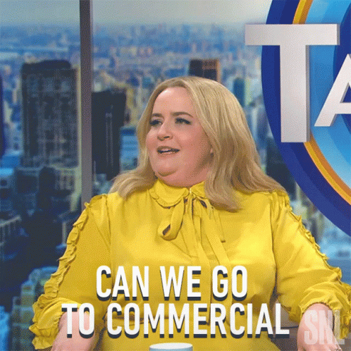 A Woman In A Yellow Shirt With The Words " Can We Go To Commercial " GIF