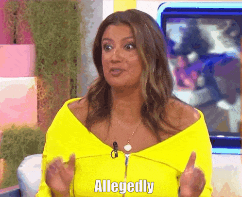 A Woman In A Yellow Top Says Allegedly In Front Of A Screen GIF