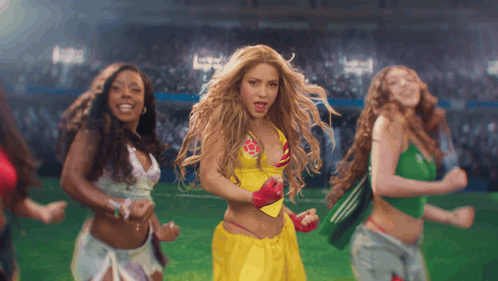a woman in a yellow top with a red star on it is dancing