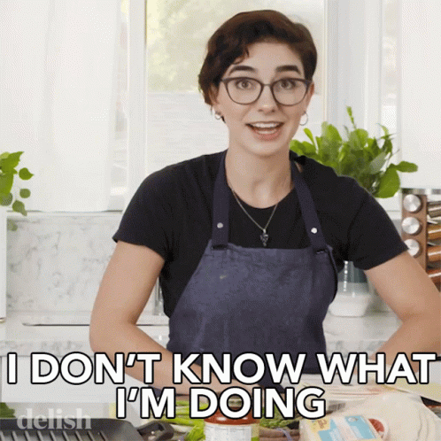 A Woman In An Apron Is Saying " I Don T Know What I 'M Doing " GIF