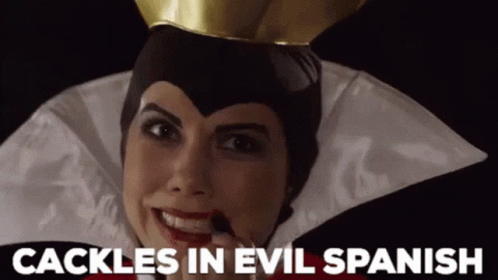 A Woman In An Evil Queen Costume With The Words " Cackle In Evil Spanish " Above Her GIF