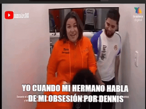 A Woman In An Orange Hoodie Is Standing Next To A Man In A White Shirt GIF