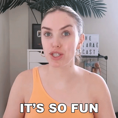 A Woman In An Orange Tank Top Says It 'S So Fun In White Letters GIF