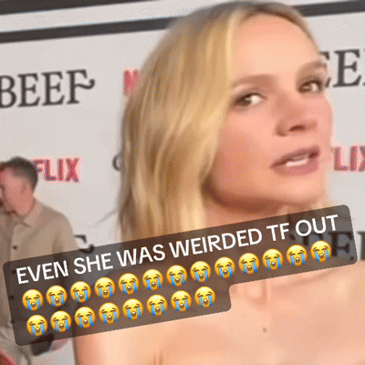 A Woman In Front Of A Sign That Says Beef GIF