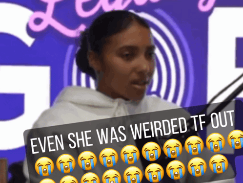 A Woman In Front Of A Sign That Says Even She Was Weird Tf Out GIF