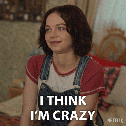 A Woman In Overalls Says I Think I 'M Crazy In A Netflix Advertisement GIF
