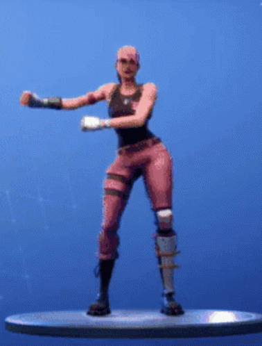 A Woman In Pink Pants And A Black Tank Top Is Dancing On A Platform . GIF