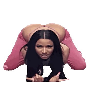 a woman in pink pants and a pink top is kneeling down