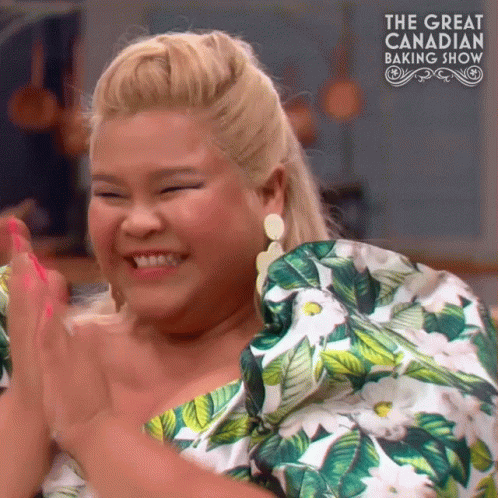 Woman Applauding In Baking Show Floral Top GIF