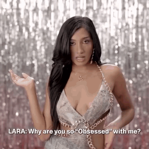 A Woman Is Asking Lara Why Are You So " Obsessed " With Me GIF