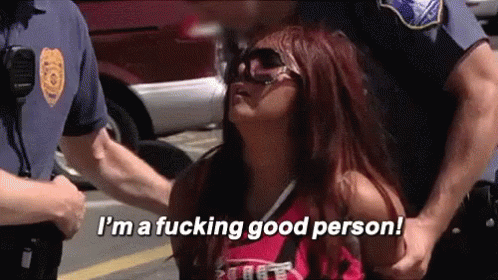 A Woman Is Being Arrested By Police Officers And Says I 'M A Fucking Good Person . GIF