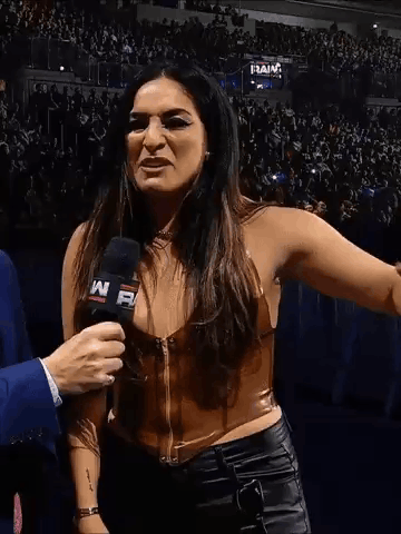 A Woman Is Being Interviewed By A Man With The Name Rodriguez Written On The Bottom GIF