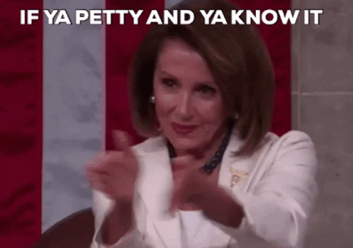 A Woman Is Clapping Her Hands In Front Of An American Flag And Says If Ya Petty And Ya Know It GIF