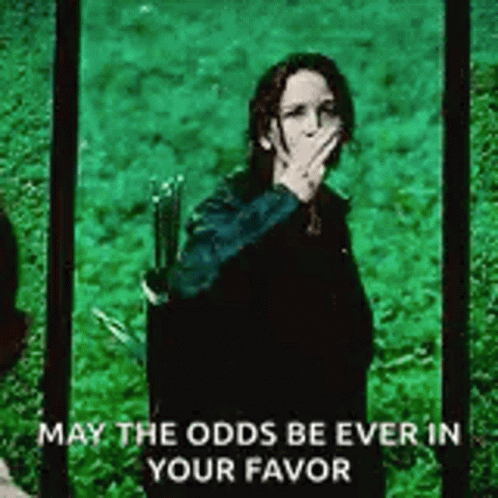 A Woman Is Covering Her Mouth With Her Hand While Holding A Bow And Arrow In Her Hand . GIF