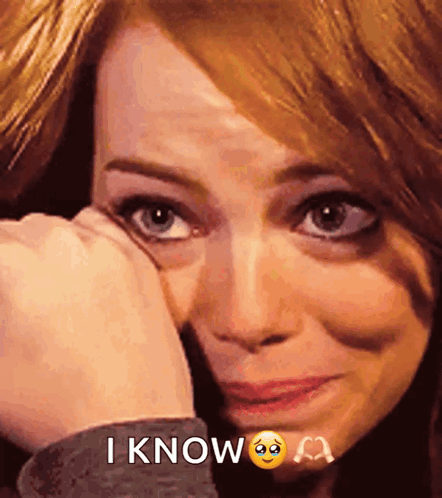 A Woman Is Crying And Covering Her Face With Her Hand And The Words I Know Are Above Her GIF