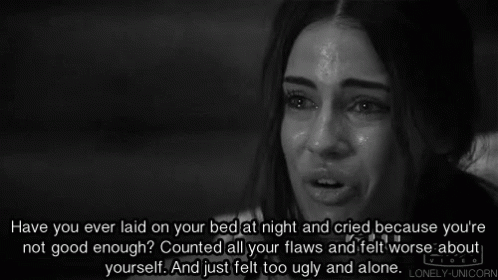 A Woman Is Crying In A Black And White Photo With A Quote From Lonely Unicorn GIF
