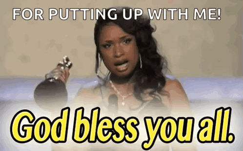 A Woman Is Crying While Holding A Microphone And Saying `` For Putting Up With Me ! God Bless You All '' . GIF