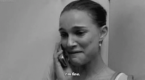 A Woman Is Crying While Talking On A Cell Phone And Says `` I 'M Fine '' . GIF