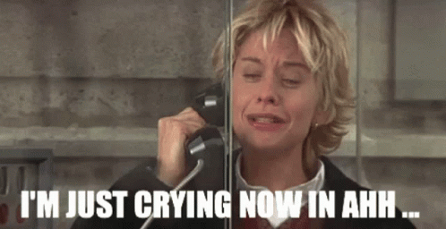 A Woman Is Crying While Talking On A Phone With The Caption I 'M Just Crying Now In Ahh GIF