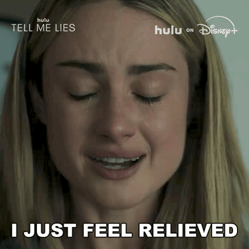 a woman is crying with the words i just feel relieved below her