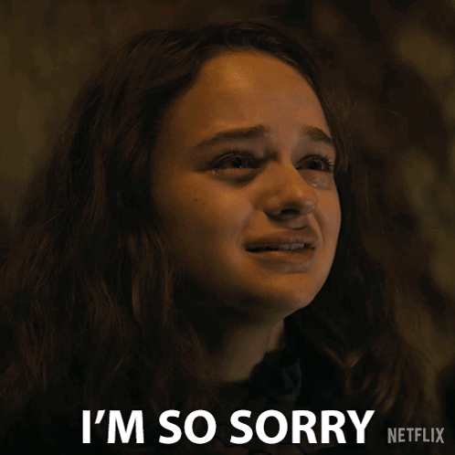 A Woman Is Crying With The Words I 'M So Sorry Behind Her GIF