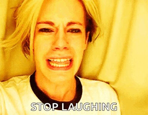A Woman Is Crying With The Words Stop Laughing Written Below Her GIF