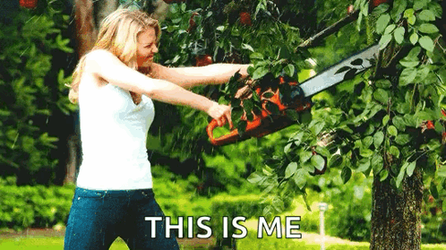 A Woman Is Cutting A Tree Branch With A Chainsaw And The Words This Is Me Are Below Her GIF