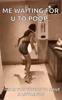 A Woman Is Dancing In A Bathroom And Waiting For U To Poop . GIF