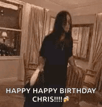 A Woman Is Dancing In A Living Room With The Words `` Happy Happy Birthday Chris '' Written On The Screen . GIF