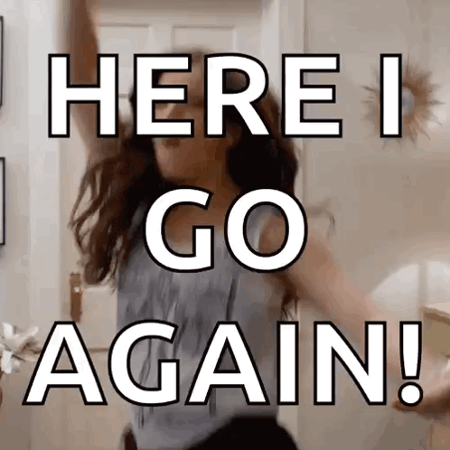 A Woman Is Dancing In Front Of A Sign That Says Here I Go Again . GIF
