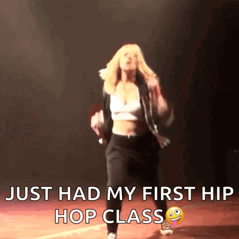 A Woman Is Dancing On A Stage With The Caption Just Had My First Hip Hop Class . GIF