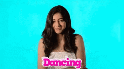 A Woman Is Dancing With Her Arms Outstretched In Front Of A Blue Background With The Word Dancing On It . GIF