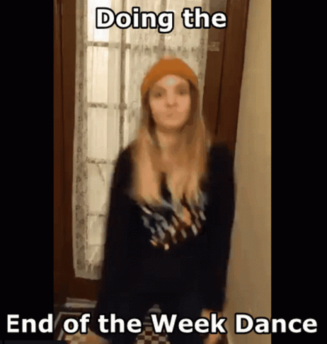 a woman is doing the end of the week dance while wearing a beanie