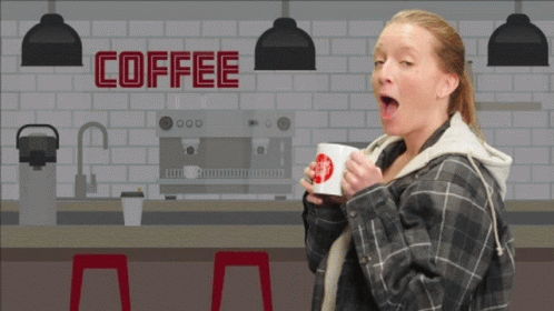a woman is drinking a cup of coffee in front of a sign that says coffee